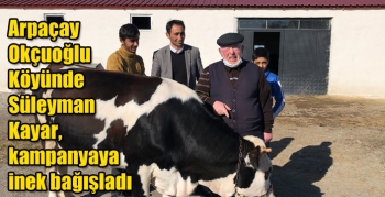 Arpaçay Okçuoğlu Köyünde Süleyman Kayar, kampanyaya inek bağışladı