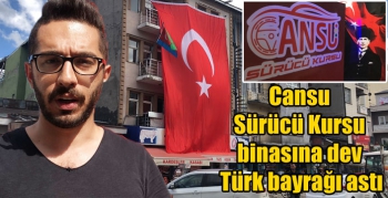 Cansu Sürücü Kursu binasına dev Türk bayrağı astı