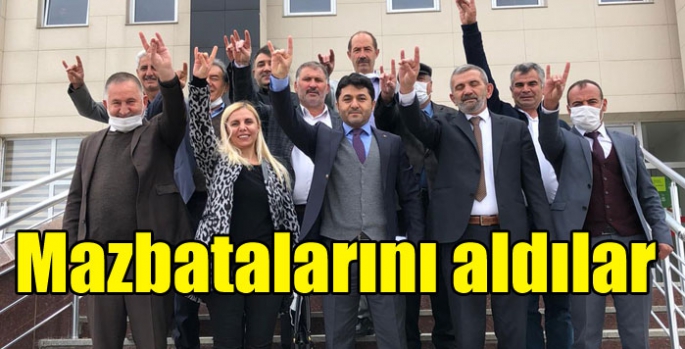 MHP Kars İl Başkanı ve yönetimi mazbatalarını aldı